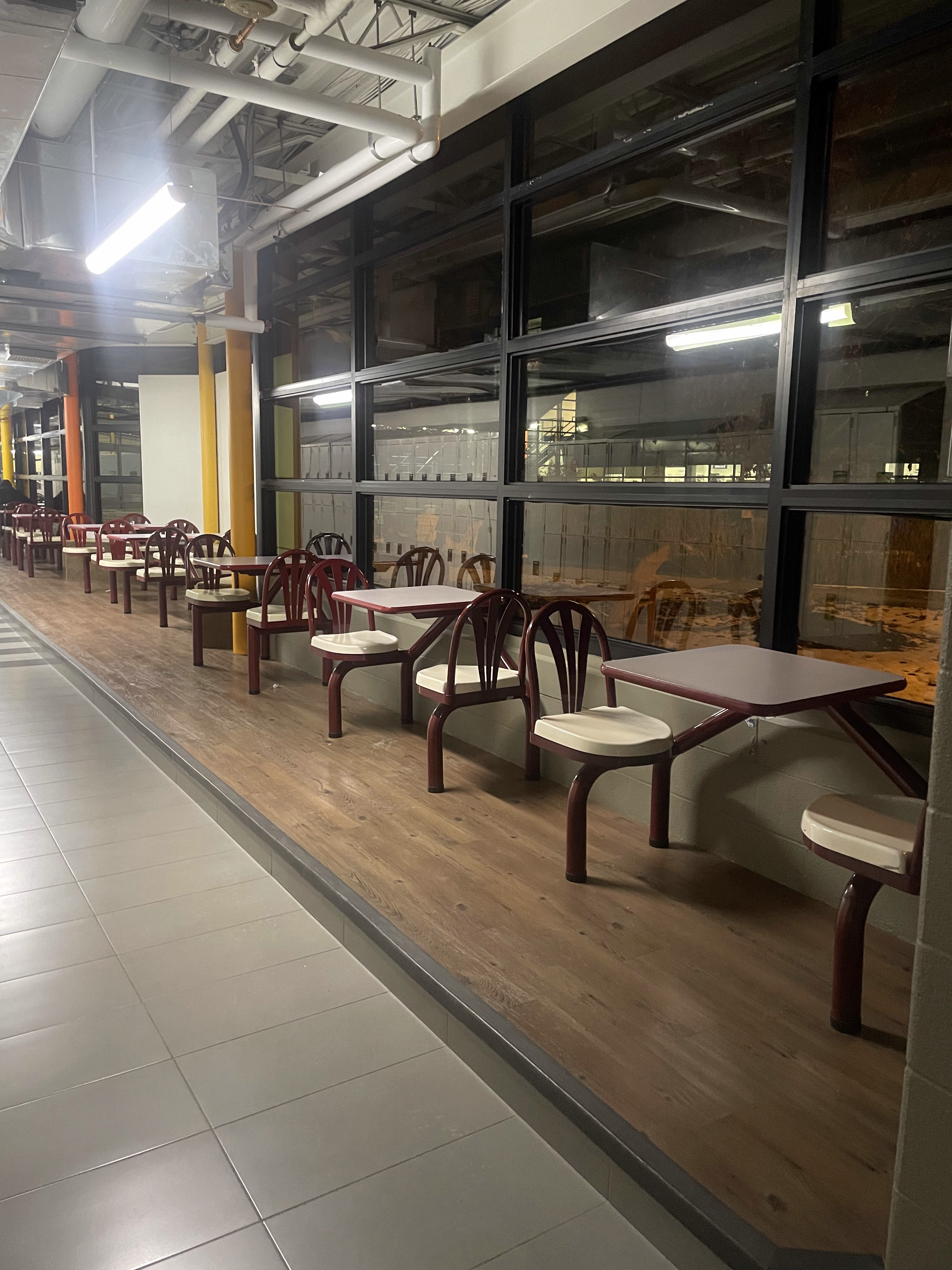 Seating Near Library: Often used to study or eat food. The style is very boring and the material is very hard. It feels very uncomfortable and not accessible.